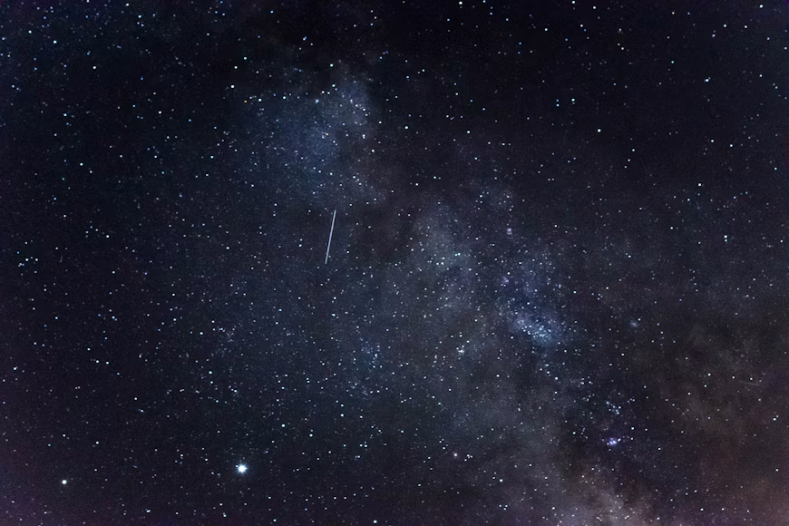 Stars scattered across a dark night sky